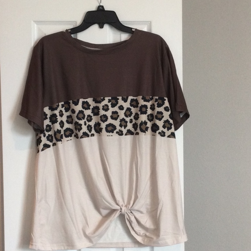 Brown and Beige top with leopard inset trim.